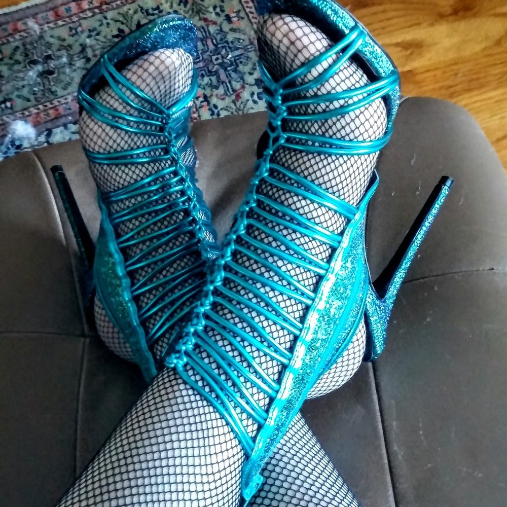 Gorgeous open heel, open toe booties.